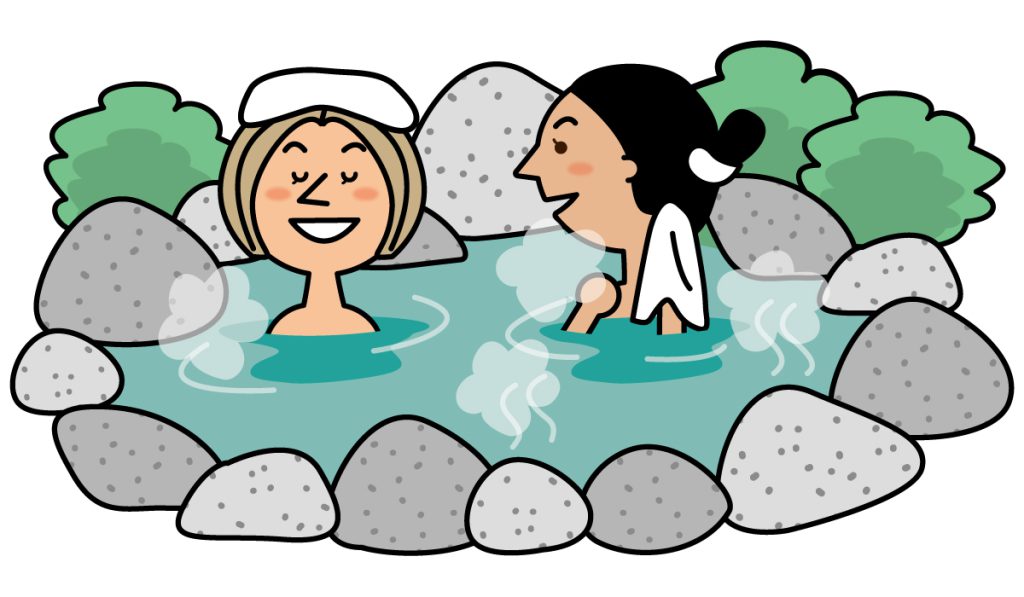 外国人女性が温泉に入浴する様子